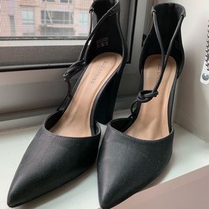 Black pointed toe heels